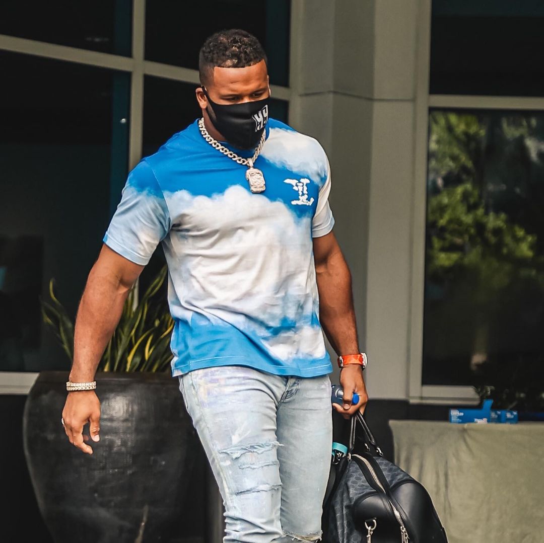 Aaron Donald wearing our Orange Camo Rubber Strap